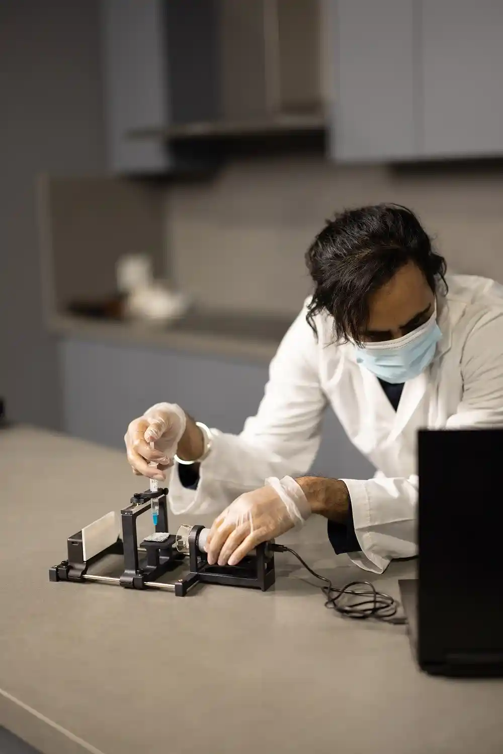 Student with droplet lab educational